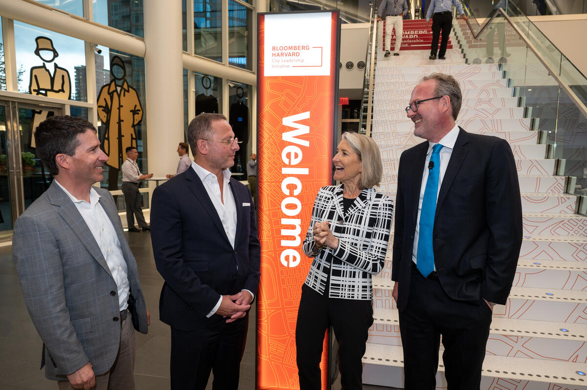 Professors standing together and talking