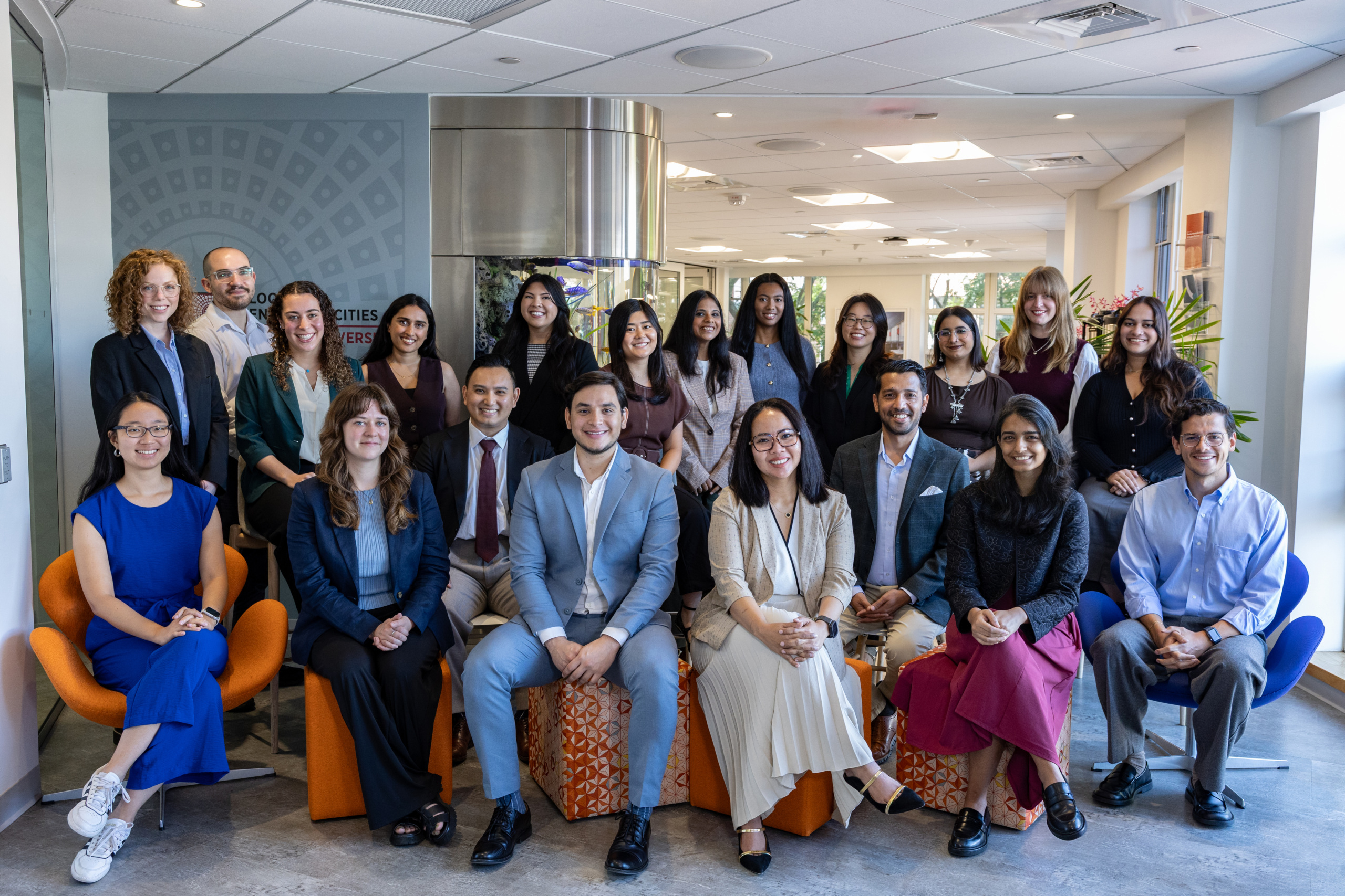 The fifth cohort of the Bloomberg Harvard City Hall Fellows pose for a group photo.